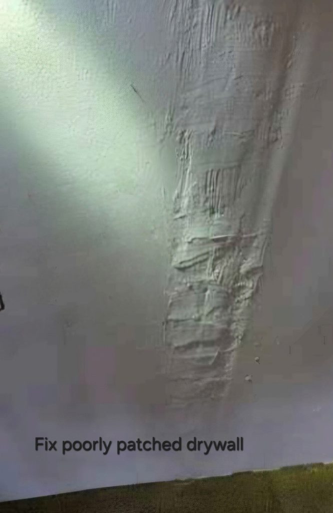 Poorly repaired drywall damage before restoration by Blue Line Home Services. 